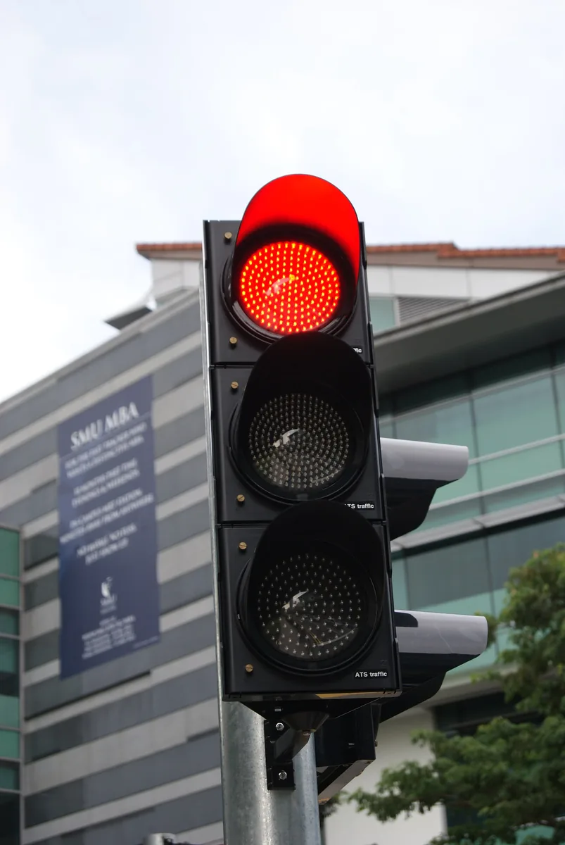 A traffic light showing red.